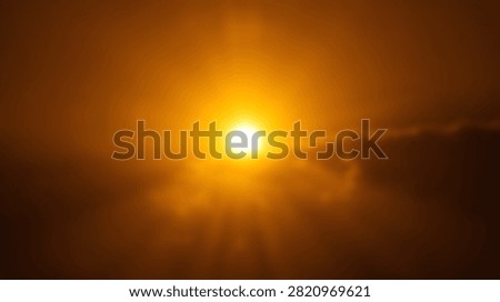 A dramatic view of the sun glowing brightly through a dense orange mist and atmospheric haze during sunset