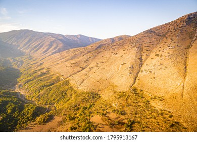 Dramatic views of the mountains from aerial perspective during the sunset.Albania adventure travels.