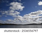 Dramatic white clouds over Lake Nosbonsing, Ontario in fall