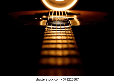 Dramatically lit guitar