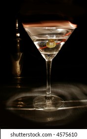 Dramatically Lit Martini With Flaming Rim.