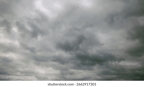 Dramatically Overcast and Dark Clouds are Covering the Beautiful Sky Above Us Completely