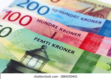 Drammen, Norway - December 29 2020: Norwegian currency notes of 50 kroner, 100 kroner and 200 kroner denominations by Norges Bank.