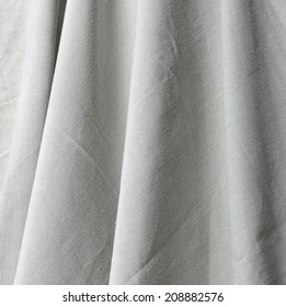 Drapery (creased) fabric background texture     