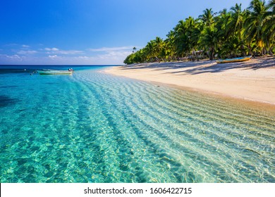 Dravuni Island, Fiji. Beach On The Tropical Islandand Clear Turquoise Water.