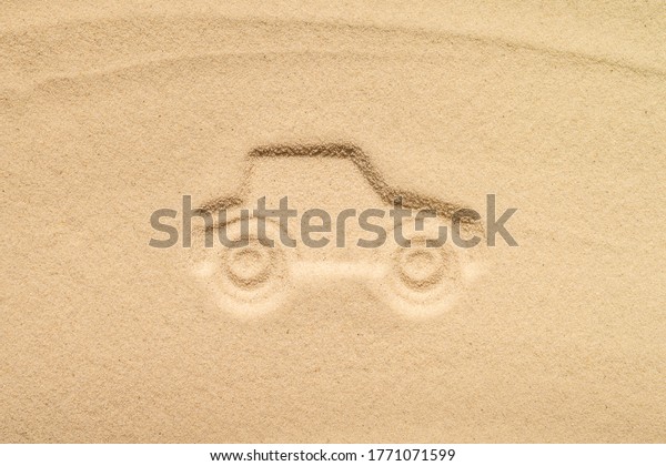 Draw car on beach sand. Car rental
concept. Insurance. Travel. Summer time. Creative
