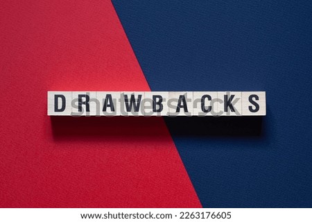 Drawbacks - word concept on cubes, text, letters
