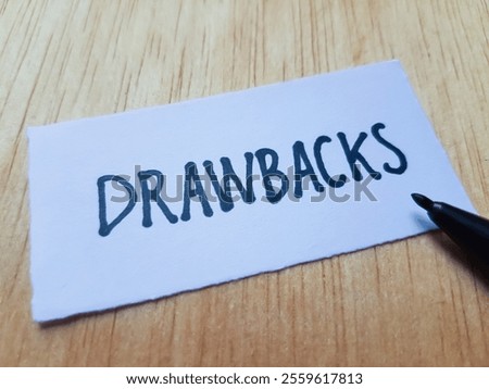 Drawbacks writting on table background.