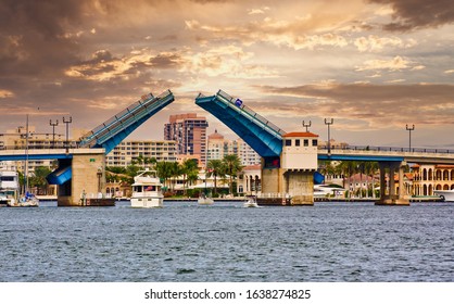 A Drawbridge Open With Boats Passing Beneath