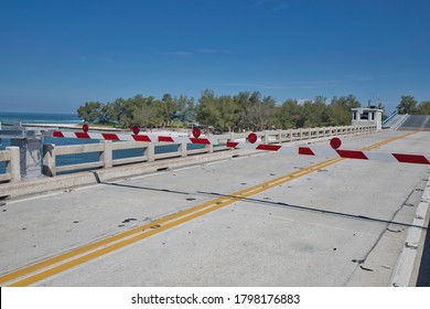 Drawbridge Up With Warning Gates Down In A Tropical Location