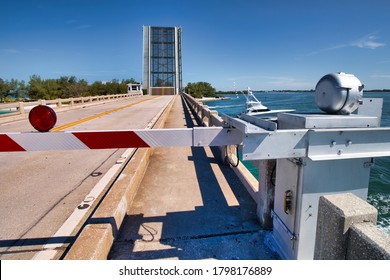 Drawbridge Up With Warning Gates Down In A Tropical Location