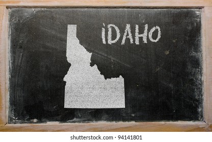 drawing of american state of idaho on chalkboard, drawn by chalk