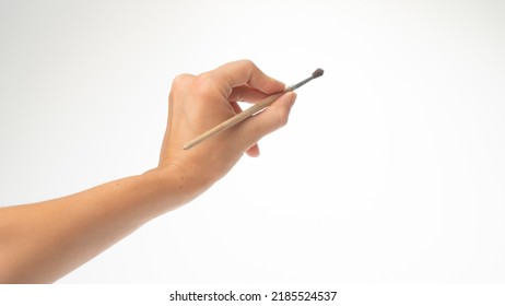 Drawing Brush In A Woman's Left Hand, Gesture Draws Left-handed