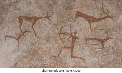 Drawing in cave painted by an ancient man wall  rock  Paints red ocher  Hunting for an animal   Neanderthal  cave man  The Stone Age  the Ice Age  Science  anthropology 