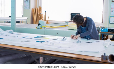 Drawing And Cutting In A Japanese Garment Factory