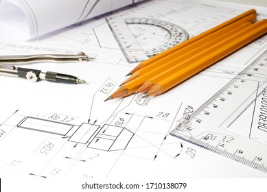 Drawing Details On The Table, Compasses, Protractor, Ruler Pencil