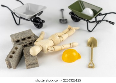 A drawing doll doing construction work. Image of industrial accident