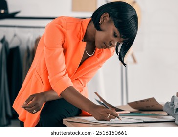 Drawing, fashion designer or black woman in workshop for small business, textile pattern or creative clothes. Ideas, sketch or African stylist in design agency for boutique, modern style or startup - Powered by Shutterstock