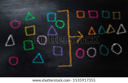 drawing geometry to categorize on chalkboard,  categorizing geometry concept with colorful chalk