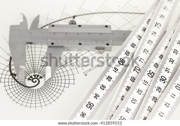 drawing of the golden section, folding ruler &\
calipers 
