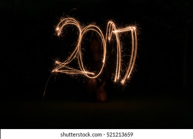 Drawing Happy New Year 2017 With Fire Sparklers Light At Night 