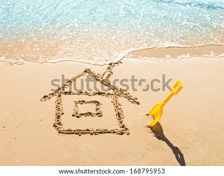 drawing of a house on the beach - concept safety and vacation