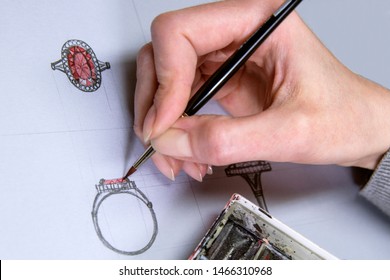 Drawing Jewelry Design. Artist designer drawing sketch jewelry on paper . Design Studio Creativity Ideas .