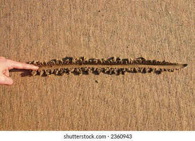 Drawing a line in the sand.  An old metaphor.