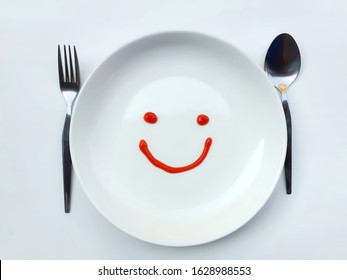 Drawing Of Smiling Empty Dish By Ketchup On A White Background. Happy Eating Concept.