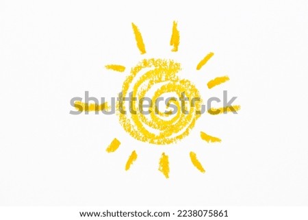 The drawing of sun made by crayons
