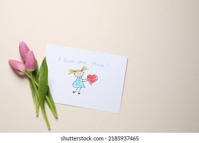 Drawing with text I love you, Mom and beautiful tulips on beige background, flat lay. Space for text