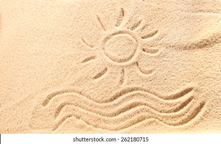 Drawing of waves and hot summer sun on golden beach sand conceptual of a summer vacation on a tropical beach