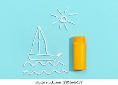 Drawings sun   boat made and sunscreen cream pale blue background