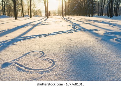 Drawn Heart In A Snow Landscape.Winter Evening Sunset Nice Background.