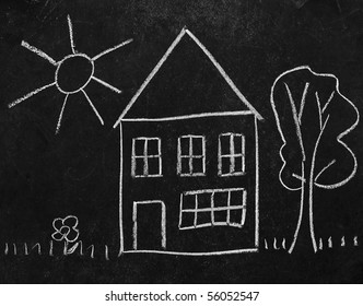 Drawn on the blackboard chalked house and a tree, sun and grass. Children drawing - Powered by Shutterstock