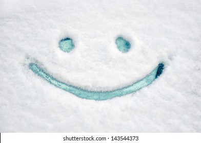 Drawn Smile On Car Glass On Snow