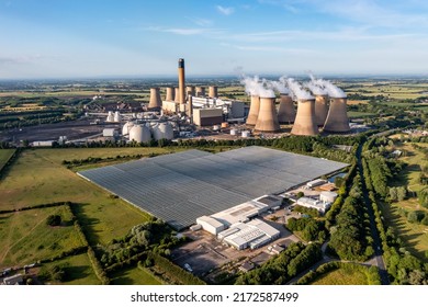 DRAX, UK - JUNE 20, 2022.  Drax Coal Fired Power Station Utilises Its Excess Heat To Heat Greenhouses At English Village Salads Factory For Food Production