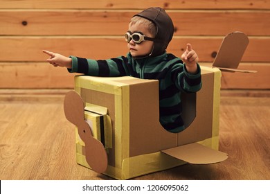 Dream, Career, Adventure, Education. Air Mail Delivery, Aircraft Construction. Pilot Travel, Airdrome, Imagination. Kid, Pilot School Innovation Little Boy Child Play In Cardboard Plane Childhood