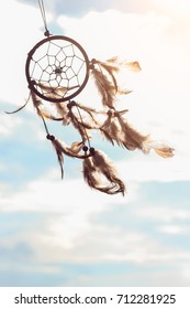 dream catcher is blowing on sky with sunlight to protect your bad dream