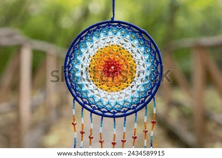 Dream catcher with feathers threads and beads rope hanging. Dreamcatcher handmade