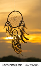 Dream Catcher on the sunset background

