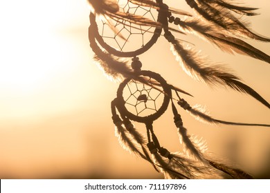 Dream Catcher on the sunset background - Shutterstock ID 711197896