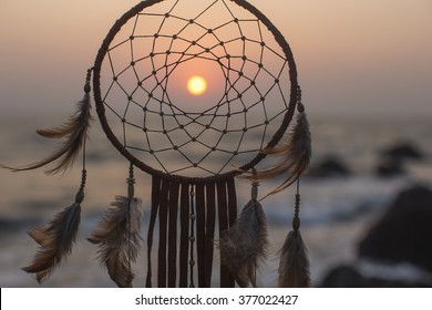Dream catcher with sea  sunset background 