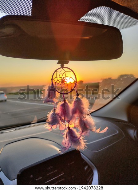 Dream filter at sunset in a\
car on the Magalhães Teixeira highway in the city of Campinas SP\
Brazil.