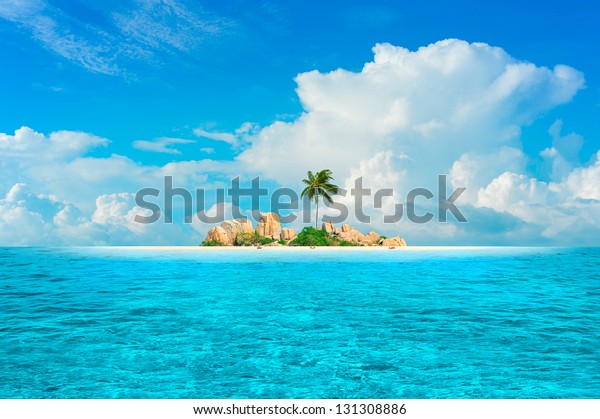 Dream Island. Amazing exotic paradise with palm three, fantasy beach, turquoise water and blue sky