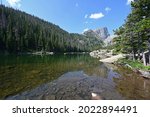 Dream Lake in Rocky Mountain National Park, Colorado on calm sunny summer morning.