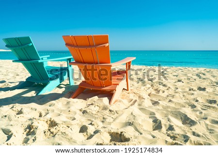 Dream paradise beach with 2 chairs at the turquoise Mediterranean sea at El Alamein near Alexandria, Egypt