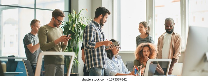 Dream Team In Middle Of Working Day At The Office