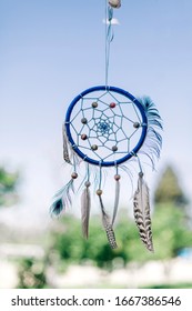 Dreamcatcher made with different feathers and string