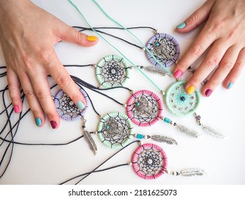 Dreamcatcher Necklace White Table And Hands 